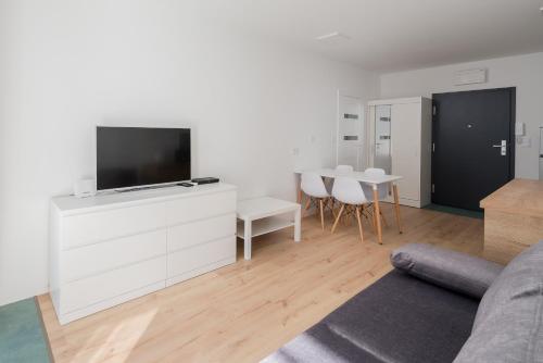 Comfort City Modern Studio Room Type - Studio with Sofa Bed