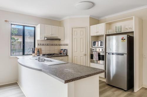 Heart of McKinnon Units by Ready Set Host in Caulfield