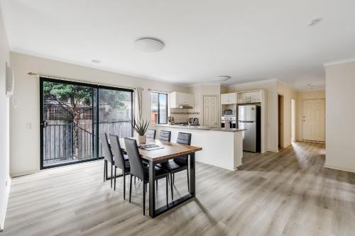 Heart of McKinnon Units by Ready Set Host in Caulfield