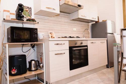 ห้องครัว, Otto Apartment Montecatini in มอนเตกาตินี แตร์เม