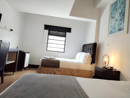 Deluxe Double Room with Two Double Beds image 2