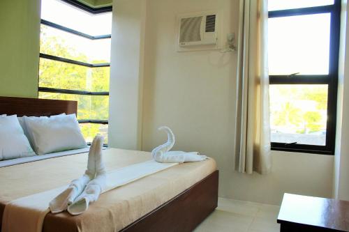 CORON VISITORS HOTEL PROMO F: WITH-AIRFARE (VIA-CEBU) ALL-IN WITH FREE CORON TOWN TOUR coron Packages