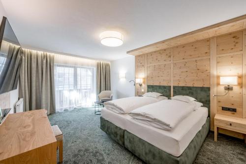 Hotel Enzian & Apartmenthotel Johannes in 오베르구르글