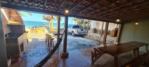 Utvendig, Casa de frente pra lagoa in Balneario das Conchas