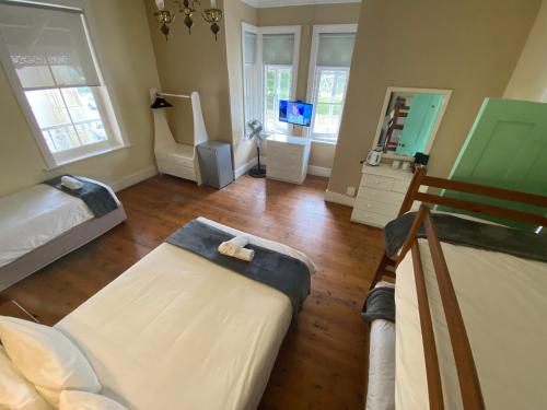 Green Door Guesthouse Room Type - Family Room with Private Bathroom Green Door Guesthouse Room Type - Family Room with Private Bathroom