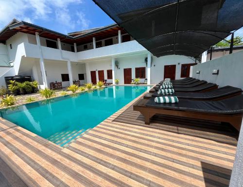 Sundowners Guesthouse – Hikkaduwa, CO