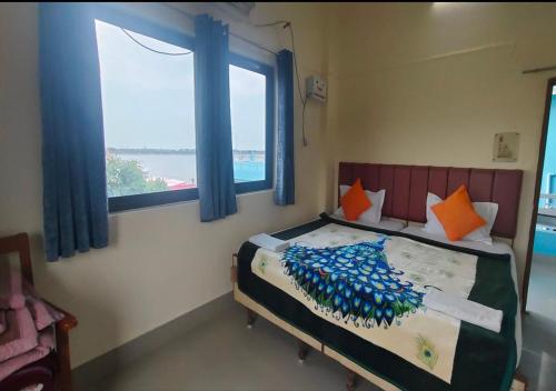 Deluxe Double Room with River View room in Sri Yoga Mandir Guest House