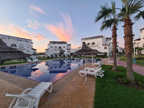 Exterior view, Charmant appartement en residence piscine in Cabo Negro