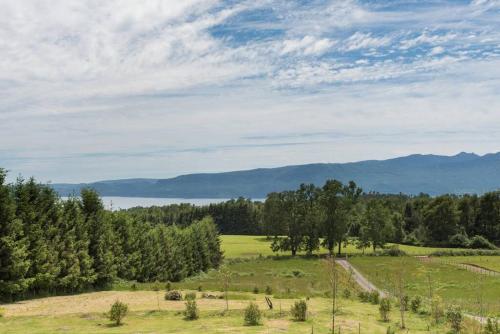 Studio con hermosa vista al lago y volcan