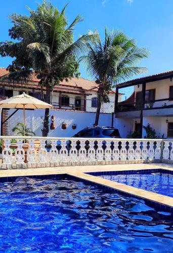 Refúgio Peró - Praia, piscina e churrasqueira