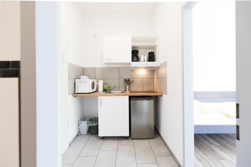 Kitchen, Berne Apartments in Rahlstedt