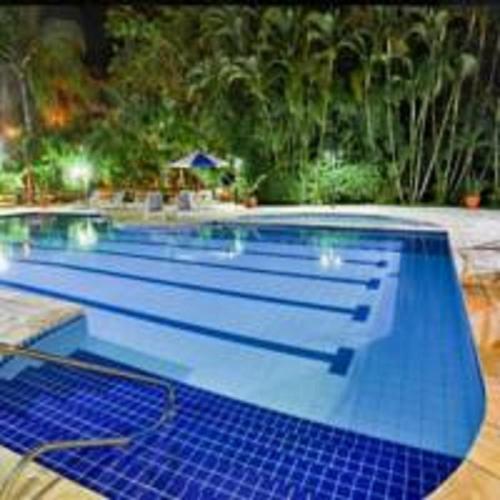 Flat Amarilis Riviera de São Lourenço Apartamento Duplex inteiro, 3 piscinas climatizadas, carregador veiculo elétrico, cozinha equipada completa, serviço de praia final semana, limpeza e enxoval completo com trocas diárias de toalhas - Biritiba-Ussu