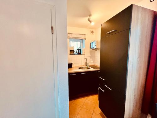 Kitchen, Sandkornchen Appartement 1 in Scharbeutz