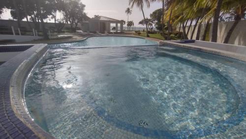 Swimming pool, Hermoso Apto Playero con Piscina in Cumaná