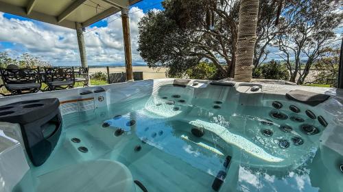 . Large riverfront home with spa and stage