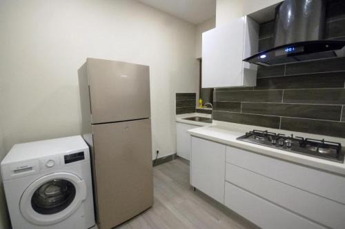 2-Bedroom Luxury Apartment - The Opus Luxury Residences by Book N Rent - image 2