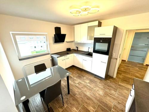 廚房, Schicke Wohnung Nähe Hannover TOP Anbindung WiFi (Schicke Wohnung Nahe Hannover TOP Anbindung WiFi) in 萊爾特