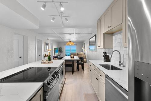 Sunrise Villa Renovated Ocean Front Condo Steps to Beach & Pool in New Smyrna Beach, USA