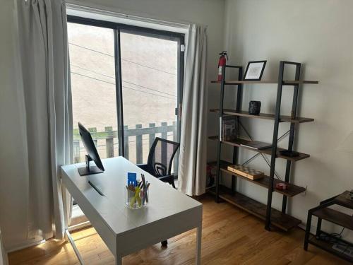 Tacas Townhome with Private Roof Deck in Baltimore, USA