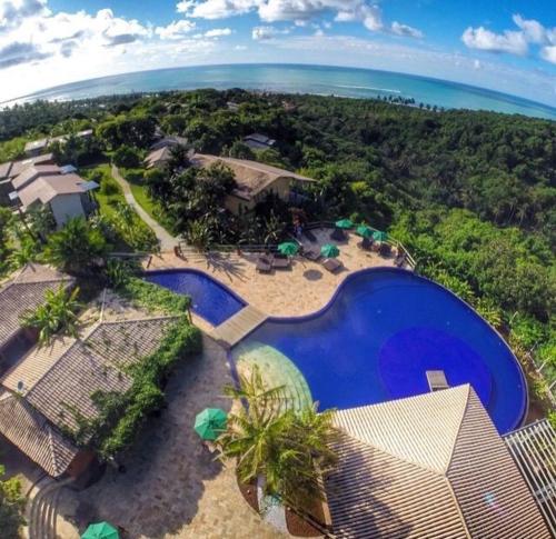 Exterior view, Bangalo Villas do Pratagy com jacuzzi in Maceio