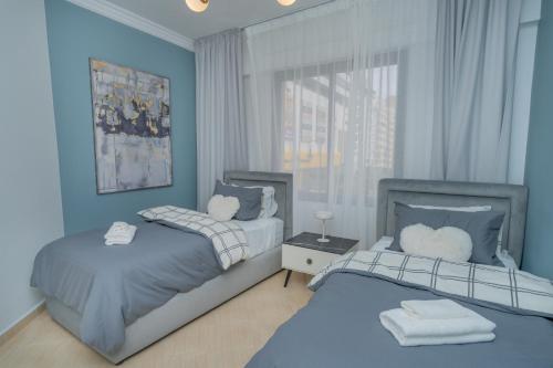 Sleek & Elegant flat close to Marina, Ideally located with Corniche 3' away and a shopping centre 1' on foot 3