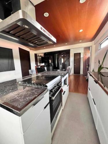 Spacious 1 BR Home with Roofdeck in Malabon in Malabon