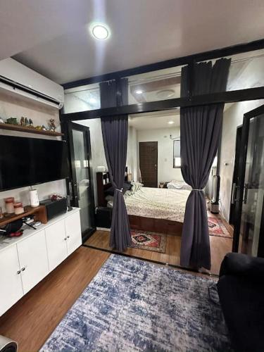 Spacious 1 BR Home with Roofdeck in Malabon in Malabon