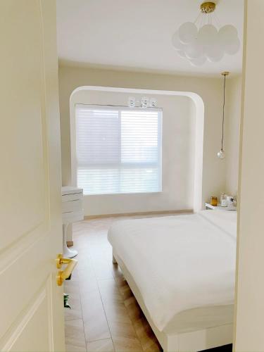 Flaneur Shanghai Hongqiao Apartment 3 mins walk to National Convention and Exhibition Center, Shanghái (foto 4)