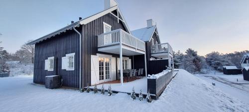 Vista exterior, Holiday home with spa, sauna and free access to indoor waterpark in Gjern