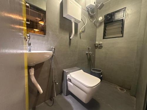 Shower, Travotown Hostel and CoWork Koregaonpark Pune near Osho International Meditation Resort and Guesthouse