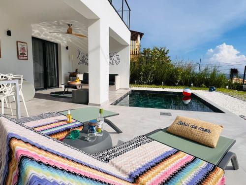 Le BÔ Diamant Garden - appartement standing avec jardin, piscine et vue mer - Location saisonnière - Le Diamant