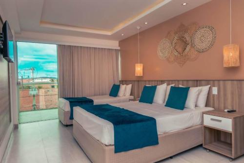 Suite Superior Vista para a Cidade room in Paradiso Peró Praia Hotel