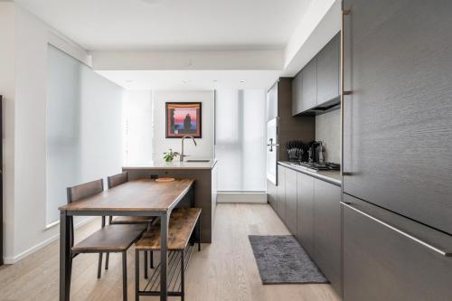 Skyline Retreat 2BR Condo Stunning City Views in Vancouver, Canada