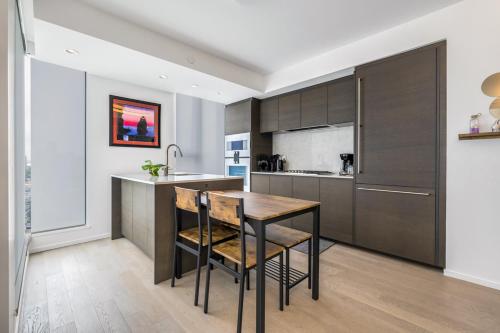 Skyline Retreat 2BR Condo Stunning City Views in Vancouver, Canada