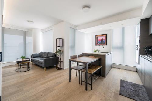 Skyline Retreat 2BR Condo Stunning City Views in Vancouver, Canada