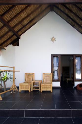 Black & White Cottages – Gili Trawangan, ID
