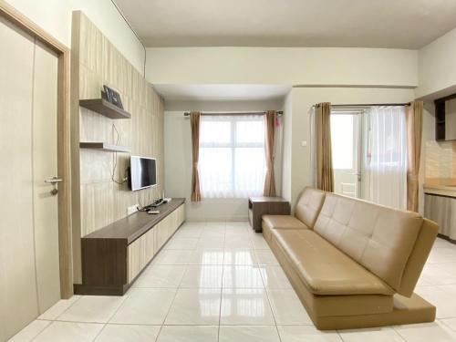 Spacious and Homey 2BR Apartment at Newton Residence By Travelio - image 2