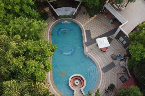 The BAEL - A Dreamscape 8 Room Luxury Farmstay GGN, Bahora