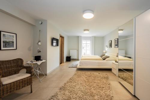 Hôtel - Restaurant " Victor Hugo" Room Type - Junior Suite with Balcony