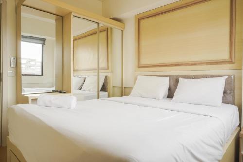Comfort 1BR with Working Room at Meikarta Apartment By Travelio, Cikarang