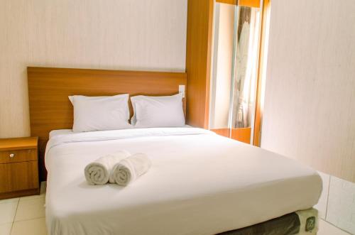 Simply and Cozy Pool View 2BR at Great Western Apartment By Travelio, Tangerang