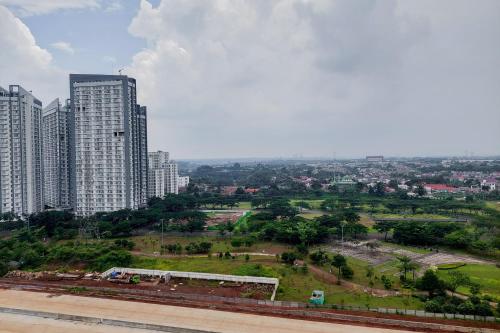 Fully Furnished with Tidy Design Studio at Sky House BSD Apartment By Travelio, Tangerang