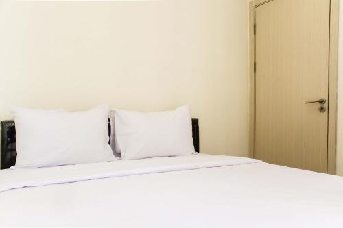 Spacious and Bright 2BR at Meikarta Apartment By Travelio, Cikarang