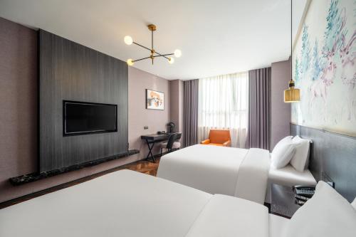 TOWO上品酒店(西安1号线开远门地铁站店) TOWO上品酒店(西安1号线开远门地铁站店)