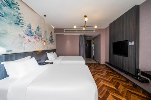 TOWO上品酒店(西安1号线开远门地铁站店) TOWO上品酒店(西安1号线开远门地铁站店)