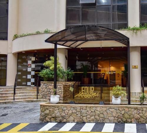 Apartamento a 70 metros da Praia de Pitangueiras SP in มอร์โร โด มาลูฟ
