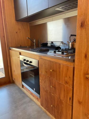 Kitchen, El Diucon Eco Lodge in Villa Lago Meliquina