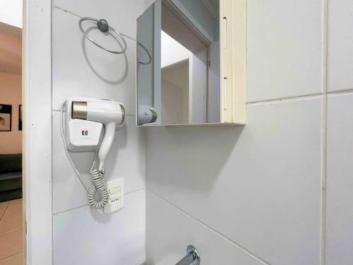Apartamento Ubatuba AR Varanda Gourmet Piscinas e 300mt Praia - image 5