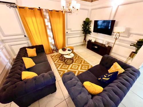 Two-Bedroom Deluxe Apartment with Balcony room in Appartement 2 et 1 chambres salon balcon canal sat wifi Netflix parking gardien 24 sur 24