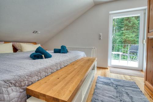 Penthouse mit Aussicht über den Wald